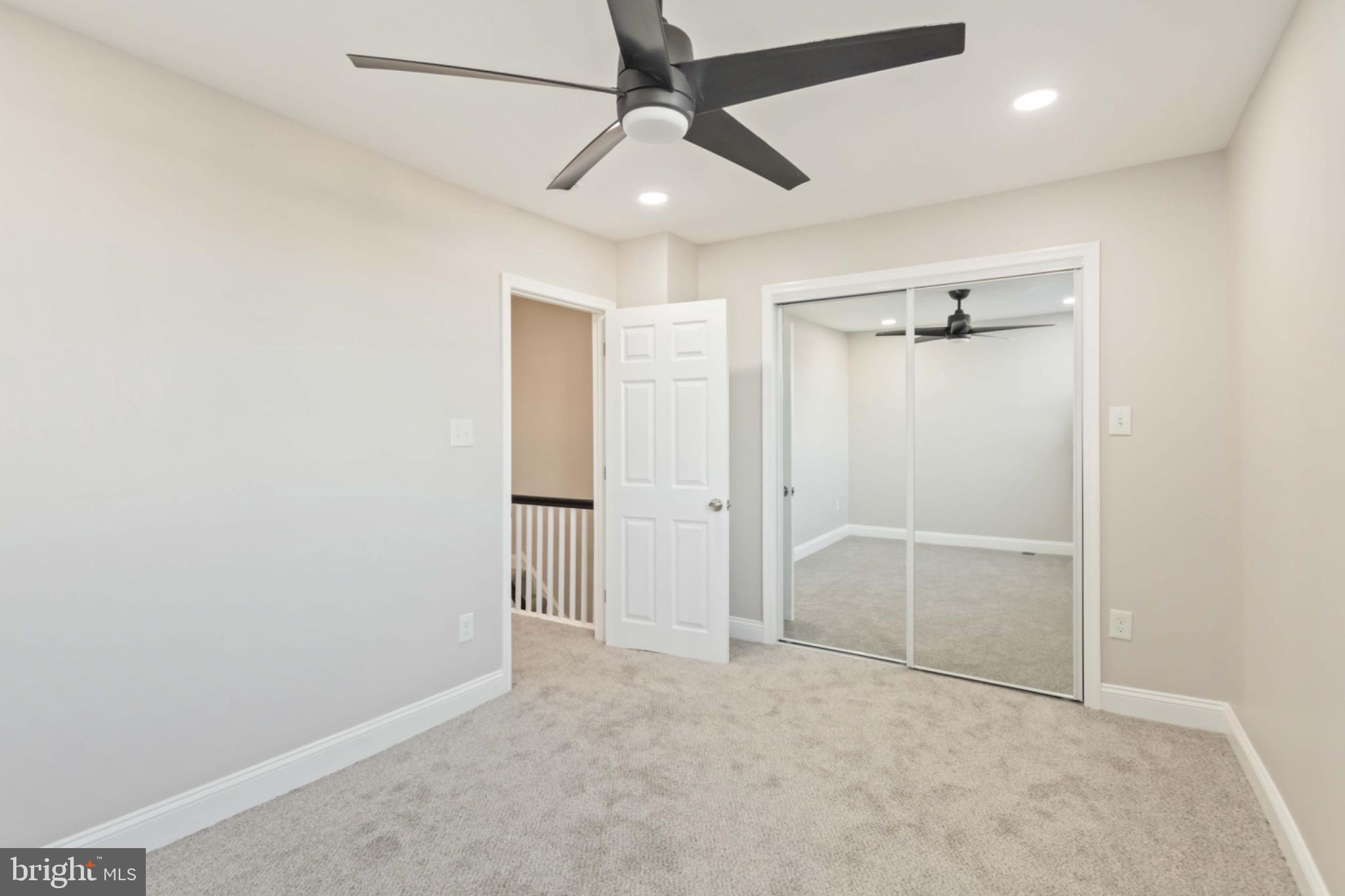 7724 Fayette Street Philadelphia, PA 19150 - Photo 24 of 33 an empty room with closet and a ceiling fan