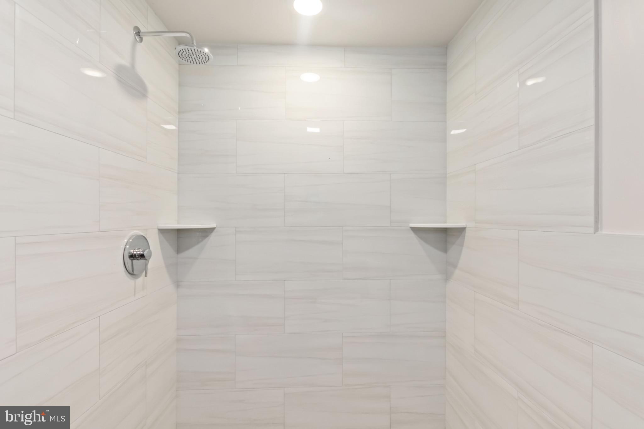 7724 Fayette Street Philadelphia, PA 19150 - Photo 26 of 33 a bathroom with a shower