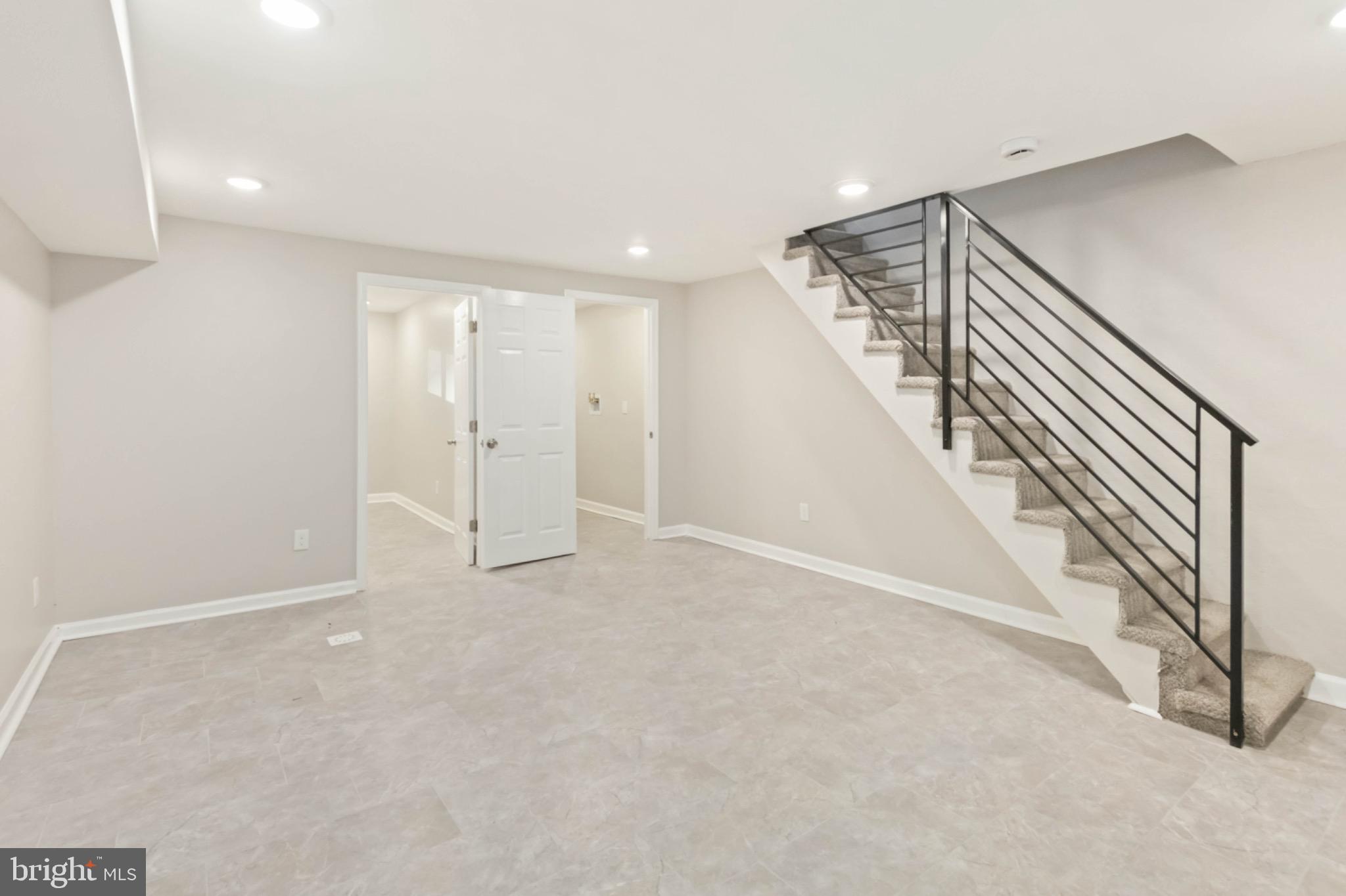 7724 Fayette Street Philadelphia, PA 19150 - Photo 27 of 33 a view of an empty room with stairs