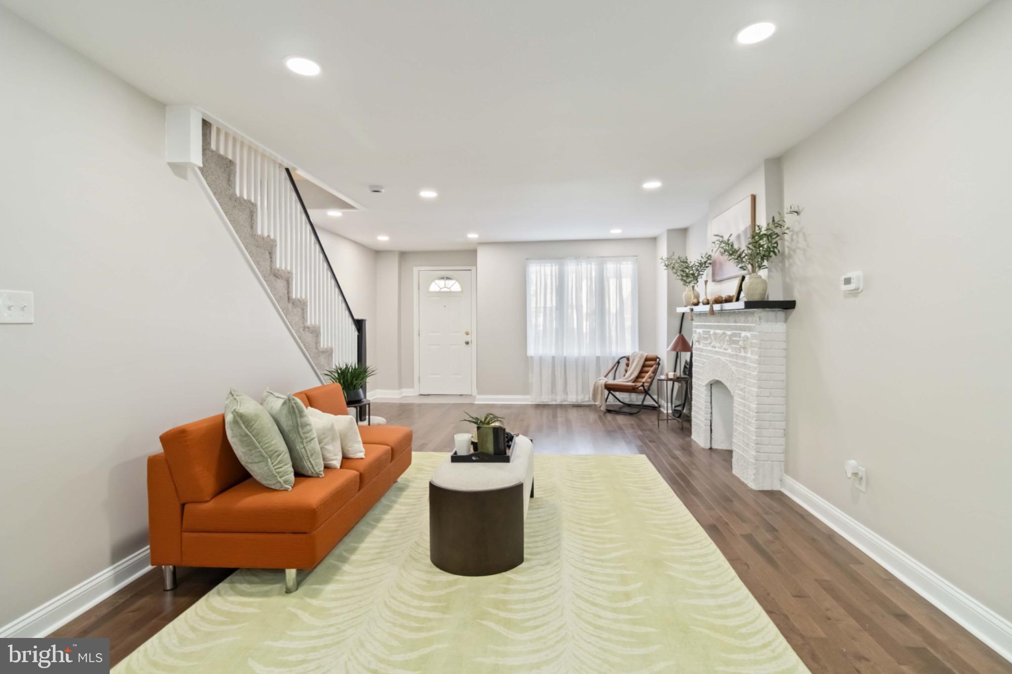 7724 Fayette Street Philadelphia, PA 19150 - Photo 3 of 33 a living room with furniture and a wooden floor