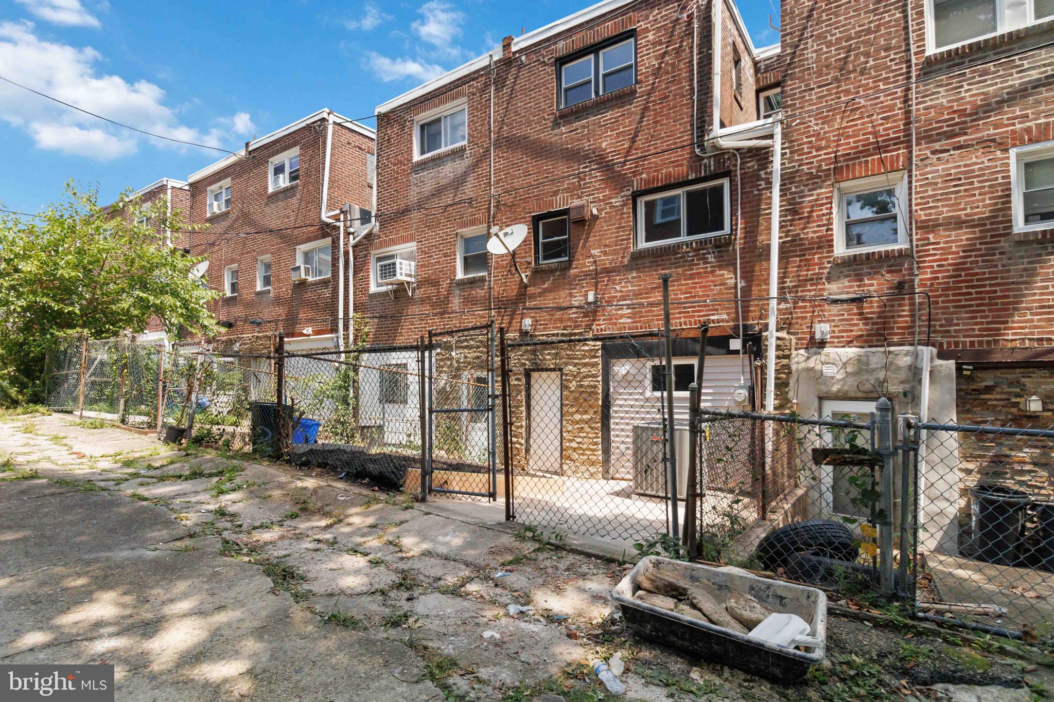 7724 Fayette Street Philadelphia, PA 19150 - Photo 33 of 33 a city street lined with parked cars and buildings