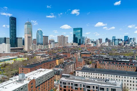 a city view with tall buildings
