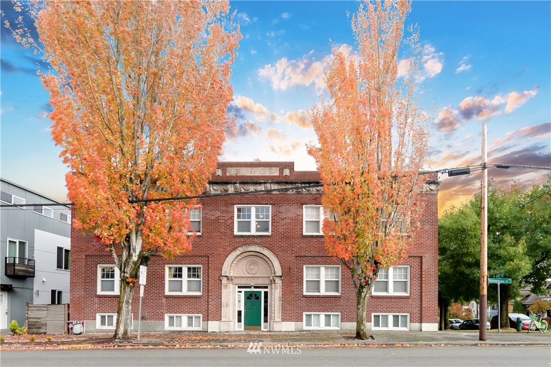 6402 Phinney Avenue North Seattle, WA 98103 - Photo 2 of 17 a front view of a building with a garden