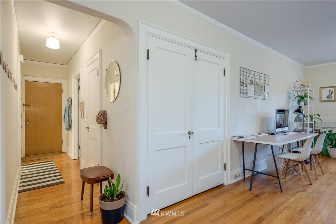 6402 Phinney Avenue North Seattle, WA 98103 - Photo 7 of 17 a view of a room with furniture and wooden floor