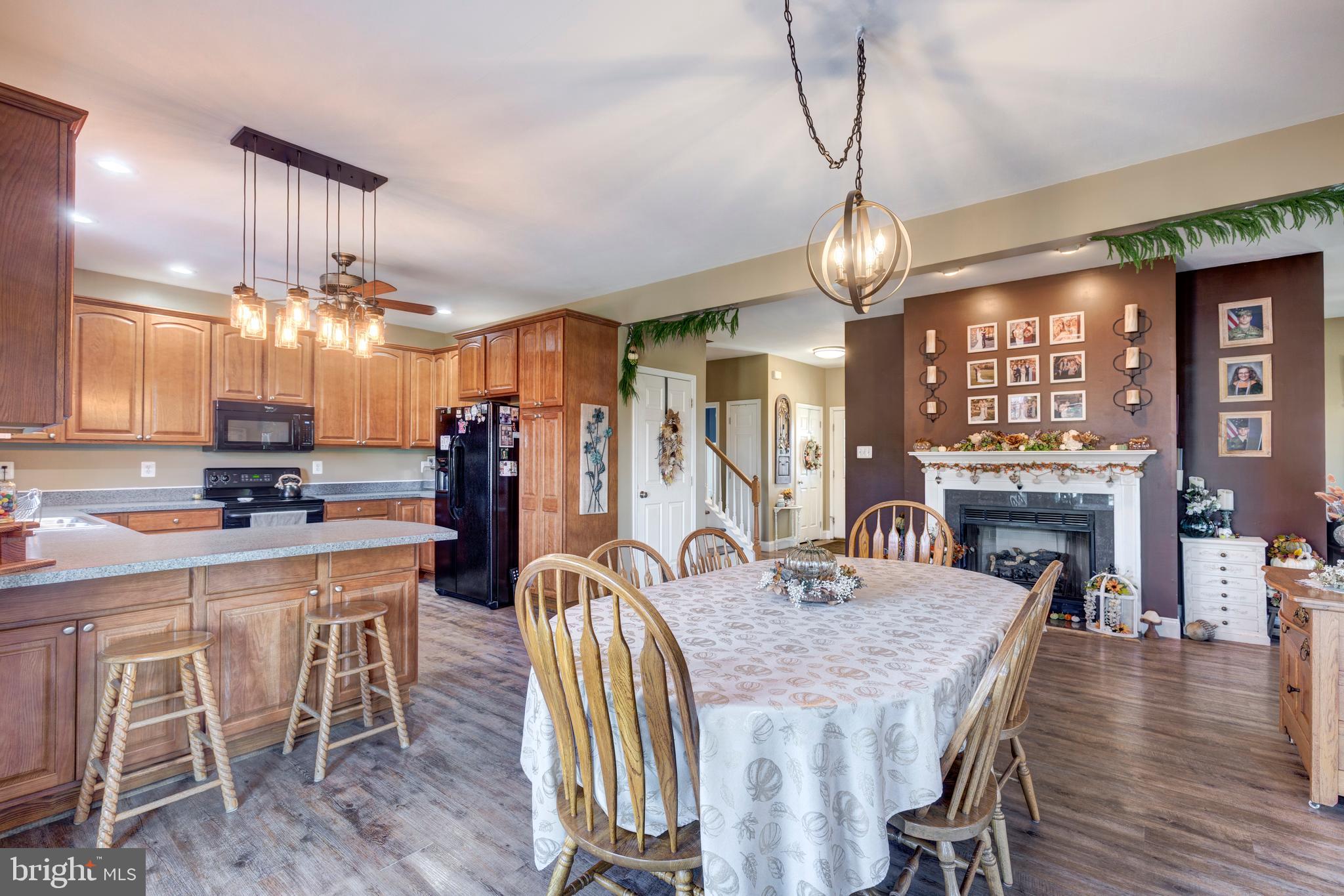 128 Pine Grove Road Hanover, PA 17331 - Photo 13 of 93 a view of a dining room with furniture window and wooden floor