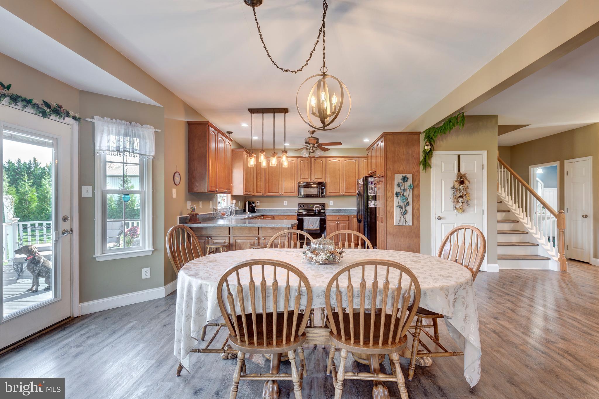 128 Pine Grove Road Hanover, PA 17331 - Photo 14 of 93 a view of a dining room with furniture window and wooden floor