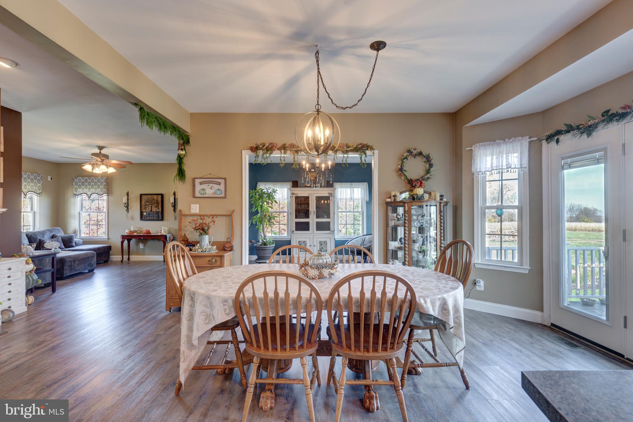 128 Pine Grove Road Hanover, PA 17331 - Photo 15 of 93 a view of a dining room with furniture window and wooden floor