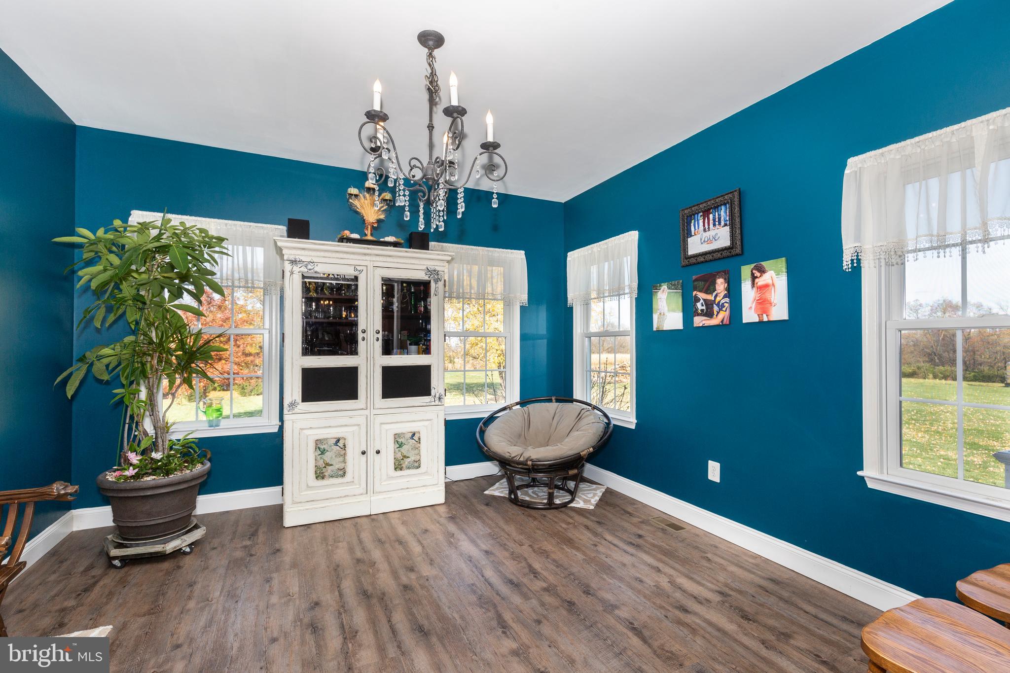 128 Pine Grove Road Hanover, PA 17331 - Photo 21 of 93 a living room with furniture and a chandelier