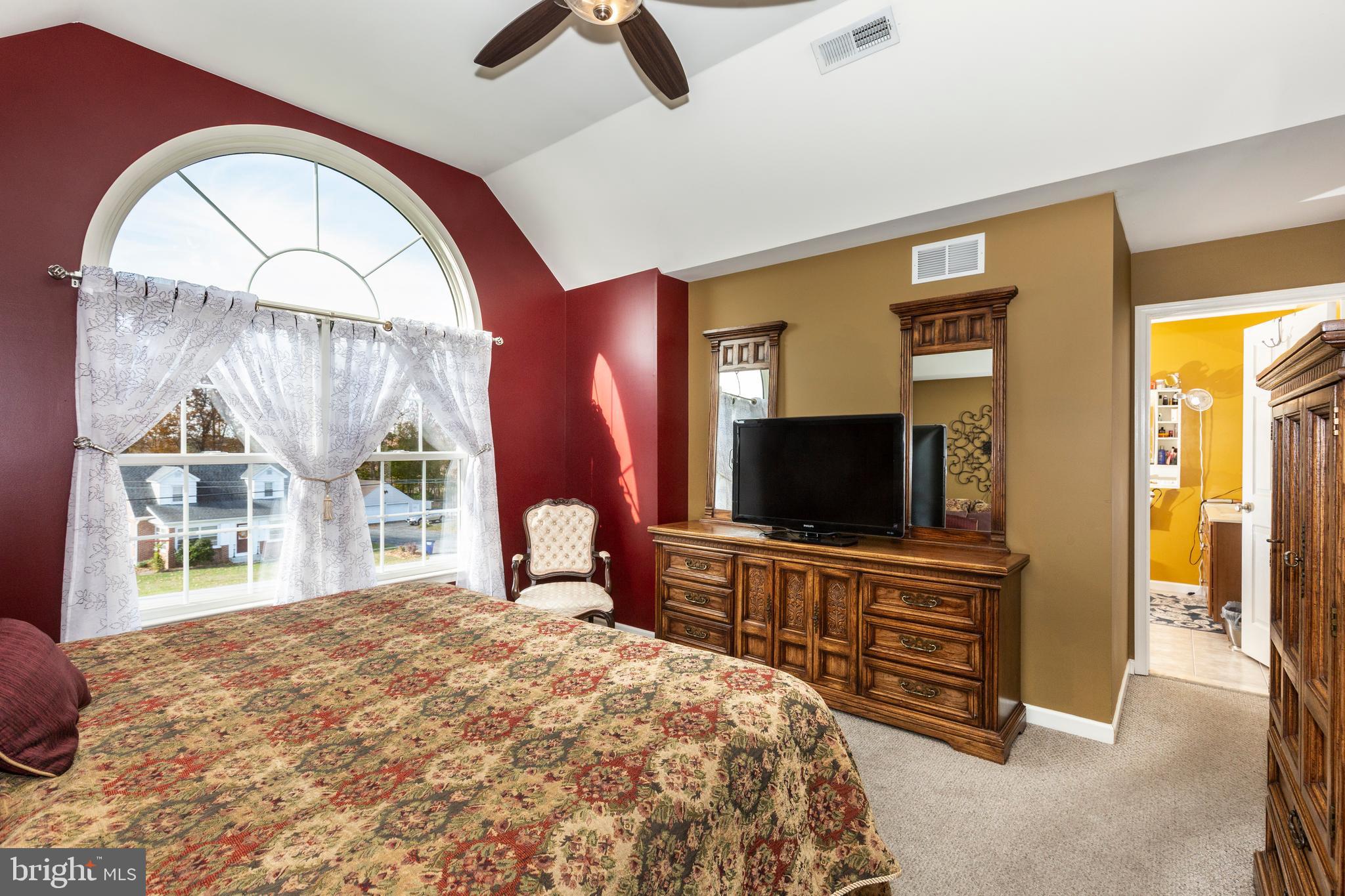 128 Pine Grove Road Hanover, PA 17331 - Photo 28 of 93 a bedroom with a bed and a flat screen tv