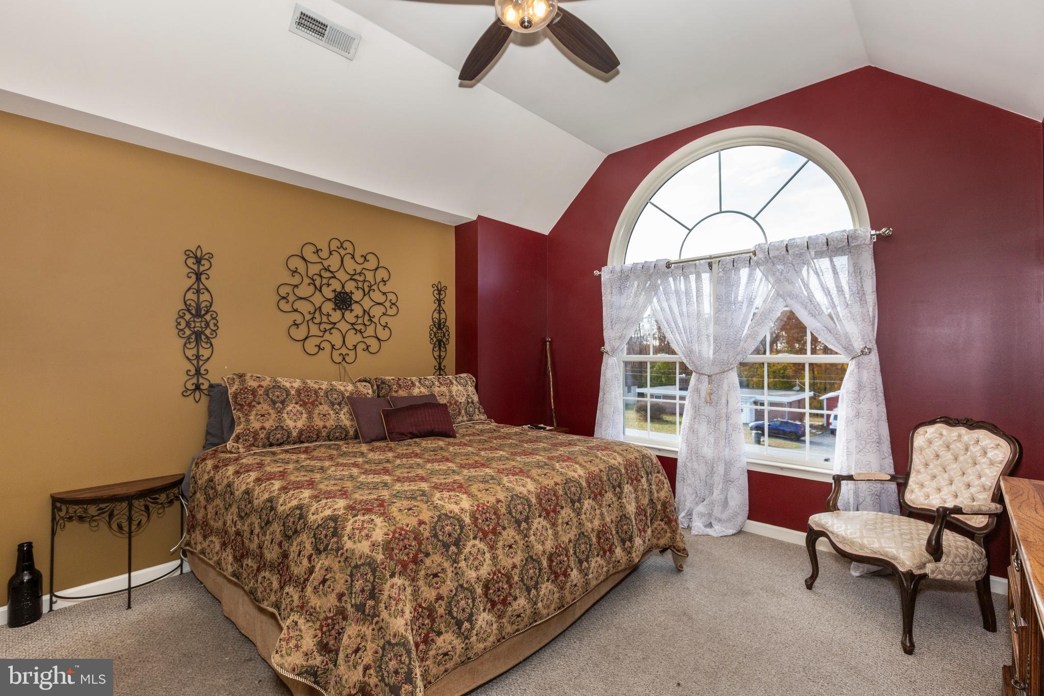 128 Pine Grove Road Hanover, PA 17331 - Photo 29 of 93 a bedroom with a bed and a large window