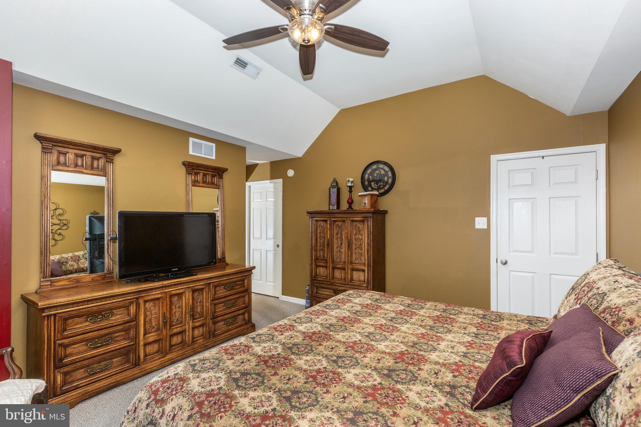 128 Pine Grove Road Hanover, PA 17331 - Photo 30 of 93 a bedroom with a bed and a flat screen tv