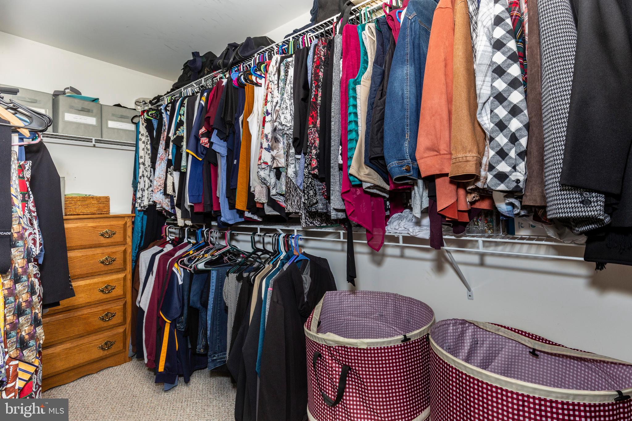 128 Pine Grove Road Hanover, PA 17331 - Photo 31 of 93 a view of walk in closet with clothes and shoes