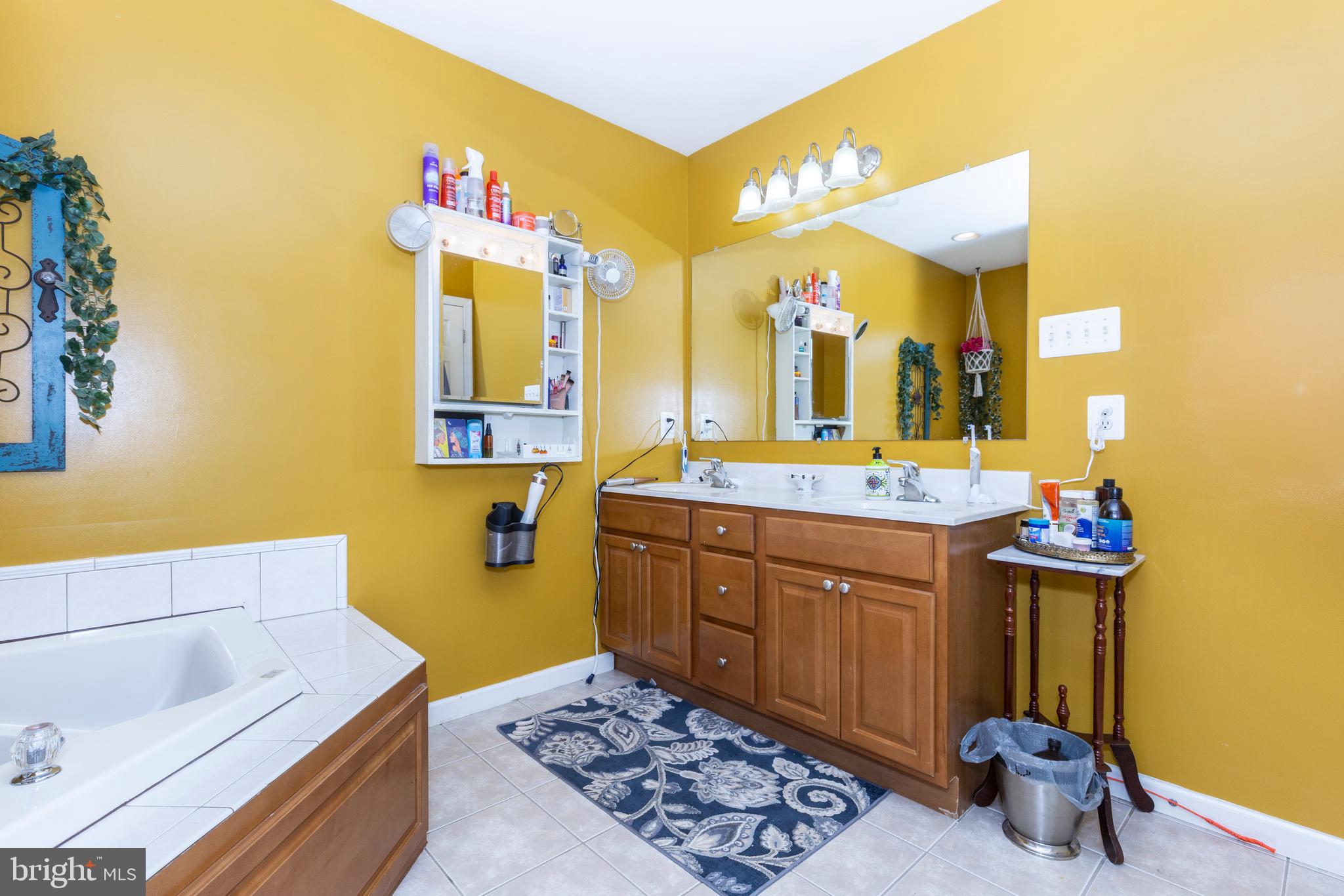 128 Pine Grove Road Hanover, PA 17331 - Photo 33 of 93 a bathroom with a sink mirror and vanity