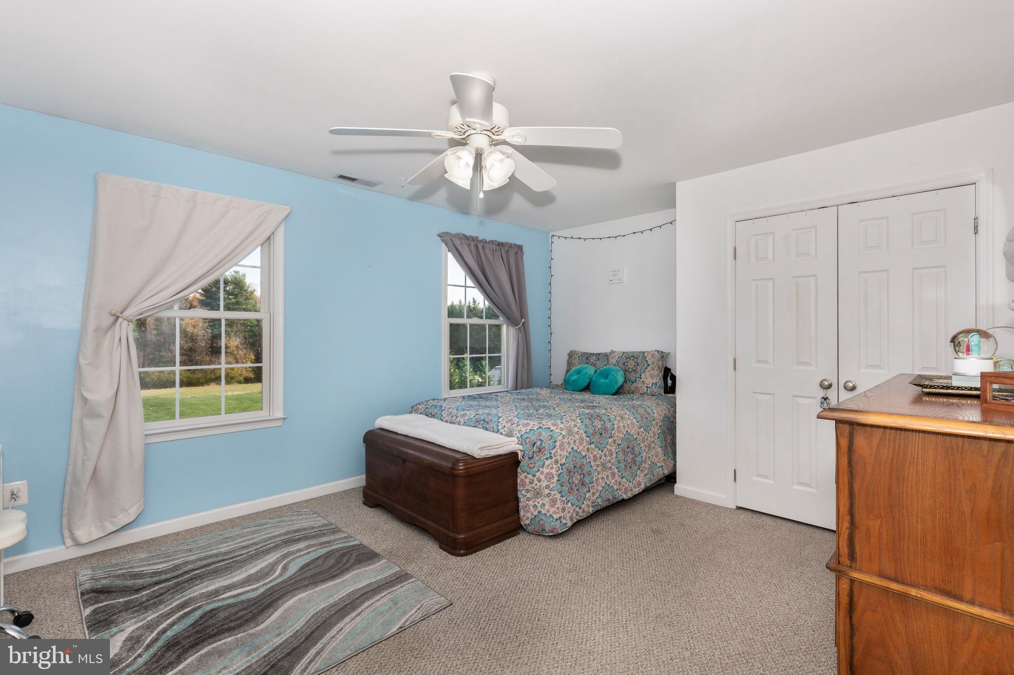 128 Pine Grove Road Hanover, PA 17331 - Photo 36 of 93 a spacious bedroom with a bed dresser and a window