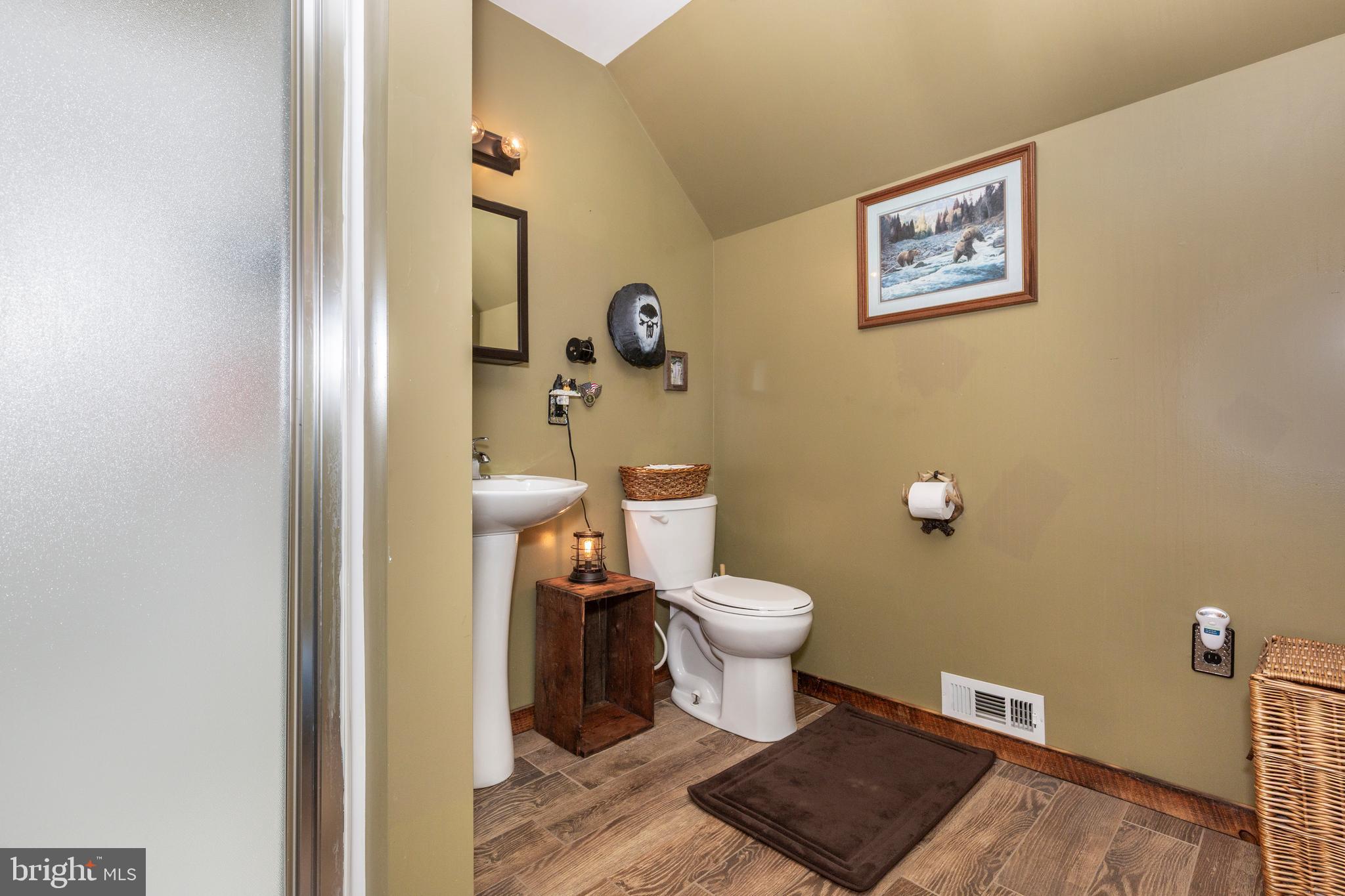 128 Pine Grove Road Hanover, PA 17331 - Photo 43 of 93 a bathroom with a toilet and a mirror