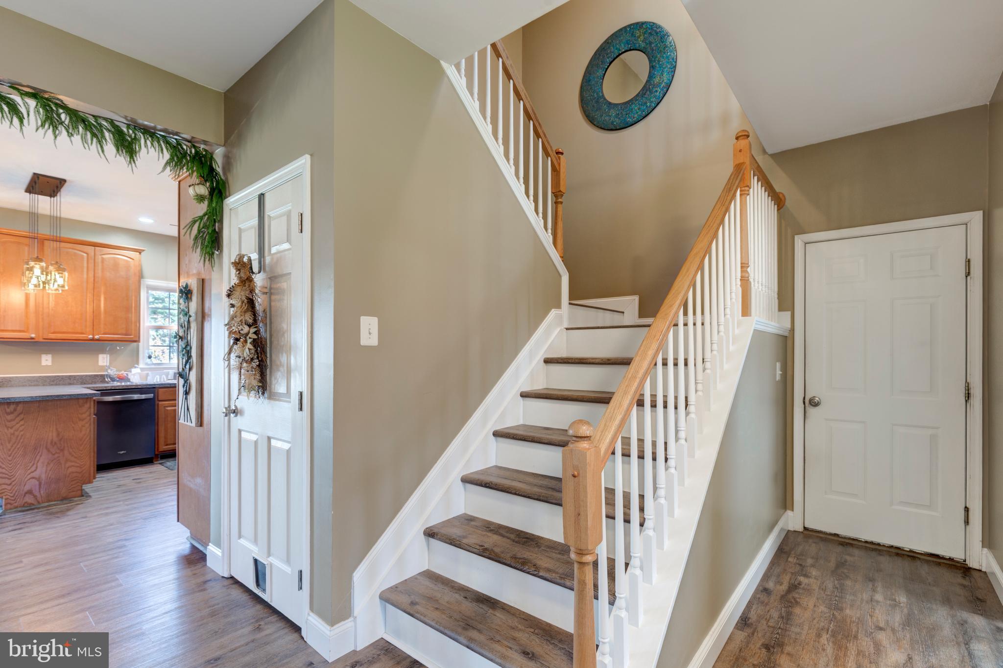 128 Pine Grove Road Hanover, PA 17331 - Photo 5 of 93 a view of entryway and hall with wooden floor