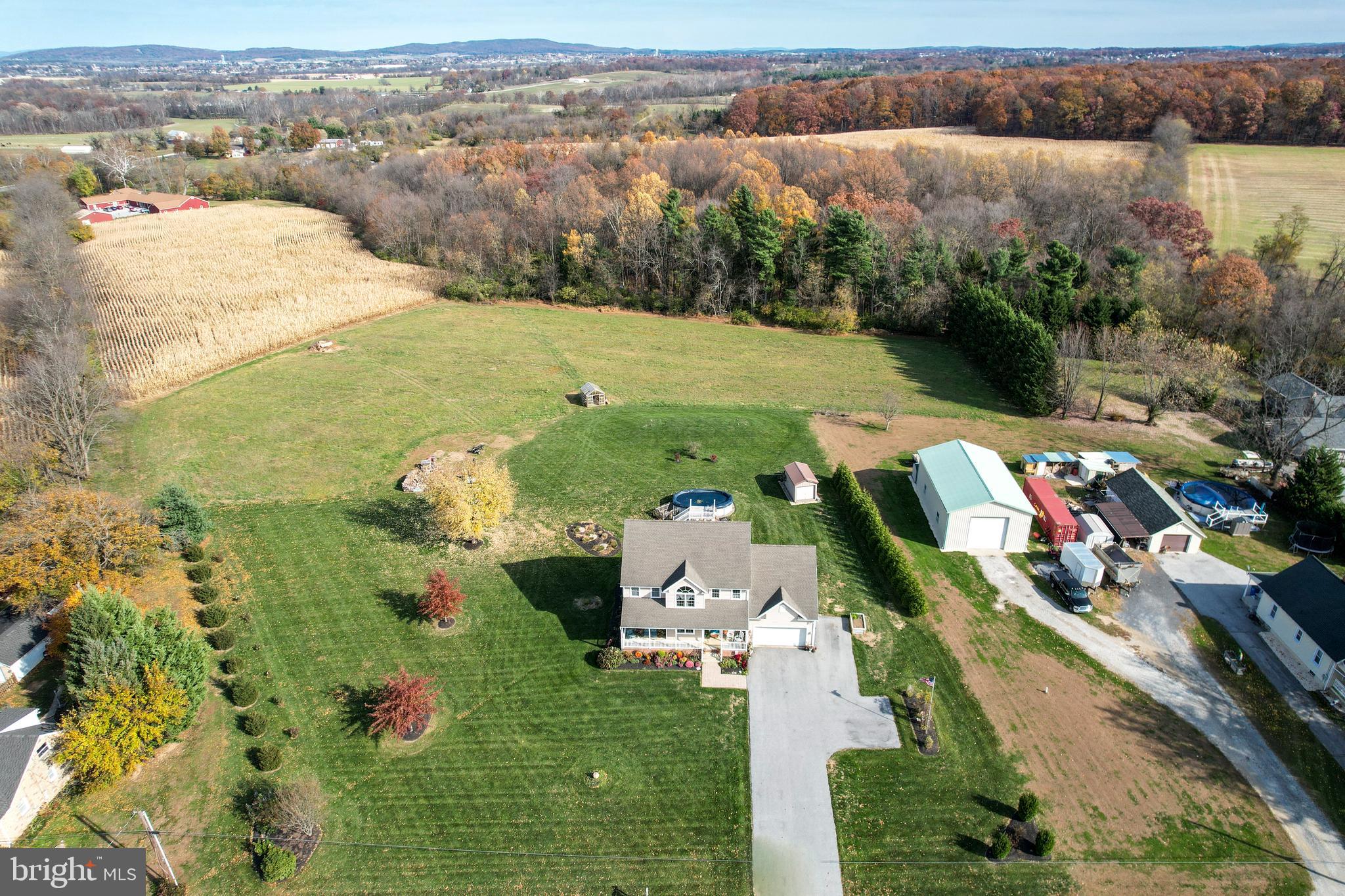 128 Pine Grove Road Hanover, PA 17331 - Photo 58 of 93 an aerial view of a house with a yard and lake view