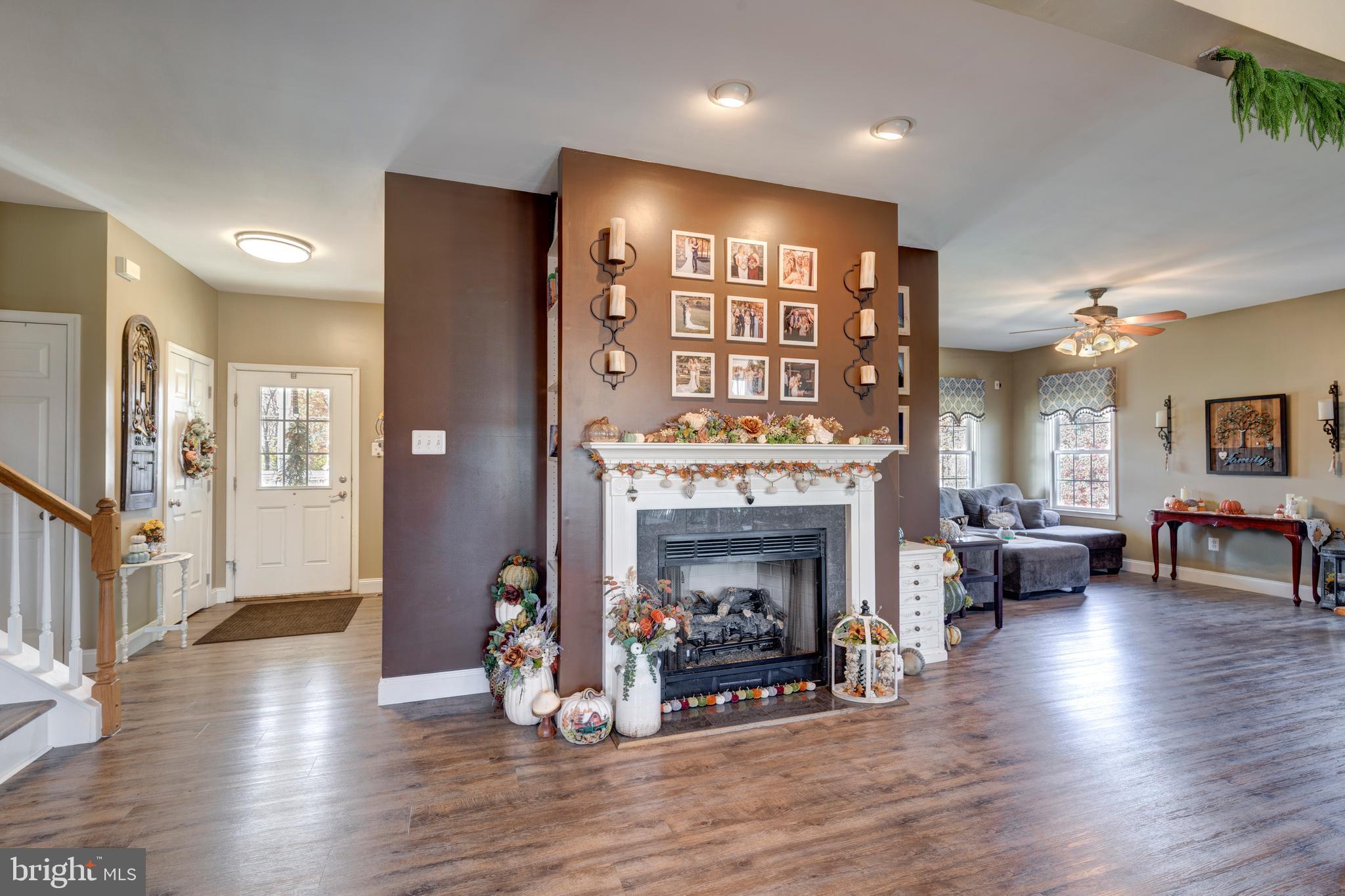128 Pine Grove Road Hanover, PA 17331 - Photo 9 of 93 a view of an entryway with fireplace and wooden floor