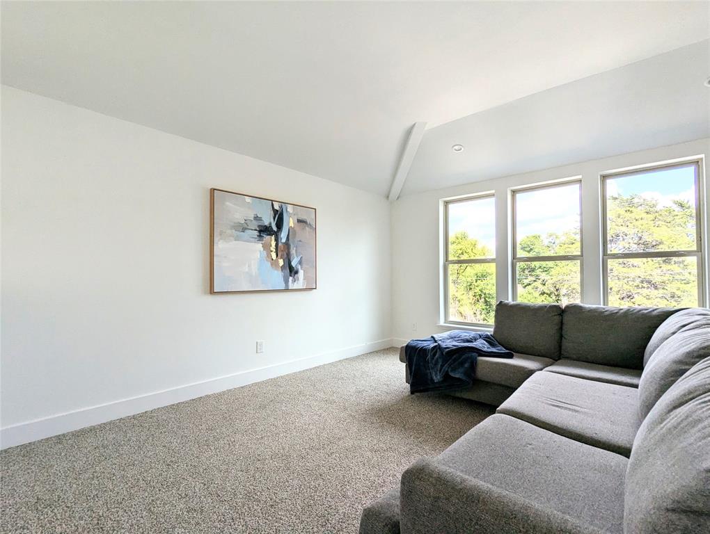 3786 Wenatche Drive Dallas, TX 75233 - Photo 14 of 16 a living room with furniture and a large window