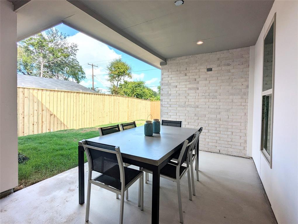3786 Wenatche Drive Dallas, TX 75233 - Photo 16 of 16 a view of a dining room with a table and chairs
