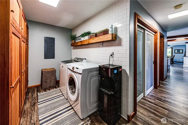 a utility room with dryer and washer