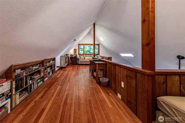 a view of entryway with wooden floor