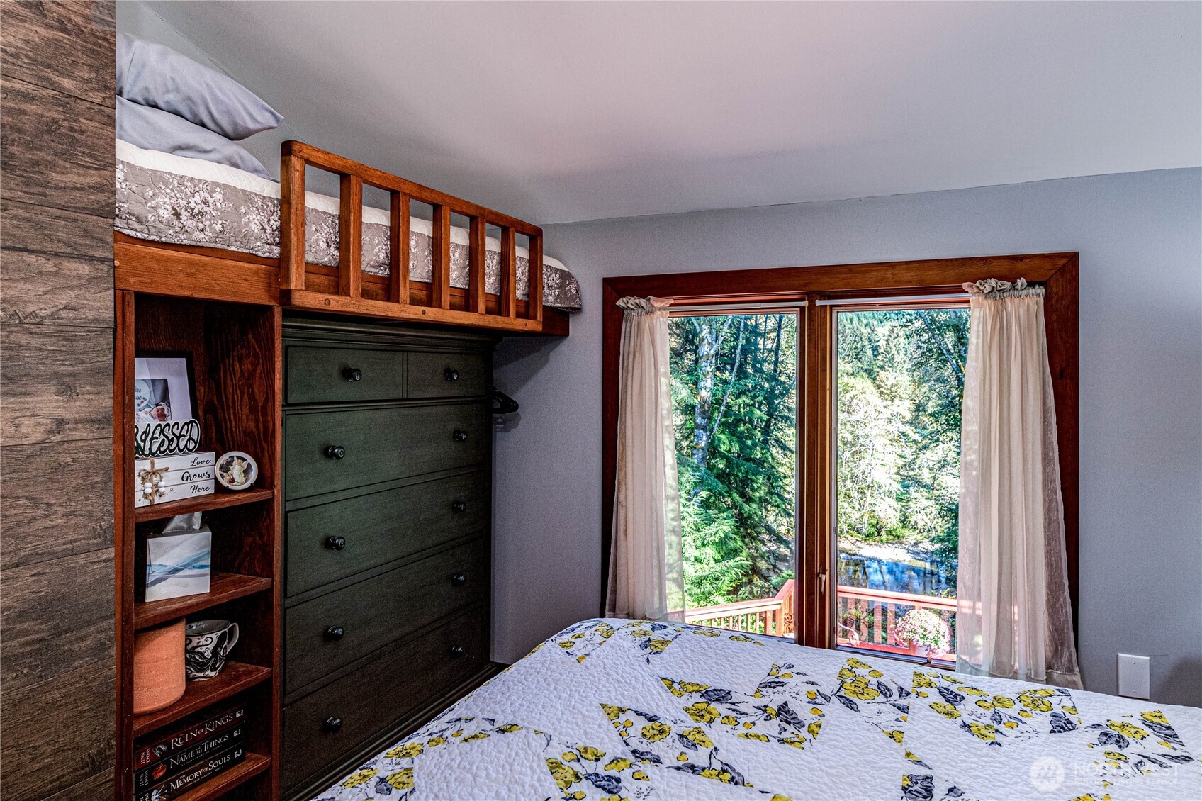 107 Dowan Creek Road Forks, WA 98331 - Photo 19 of 40 a bedroom with a bed and a window