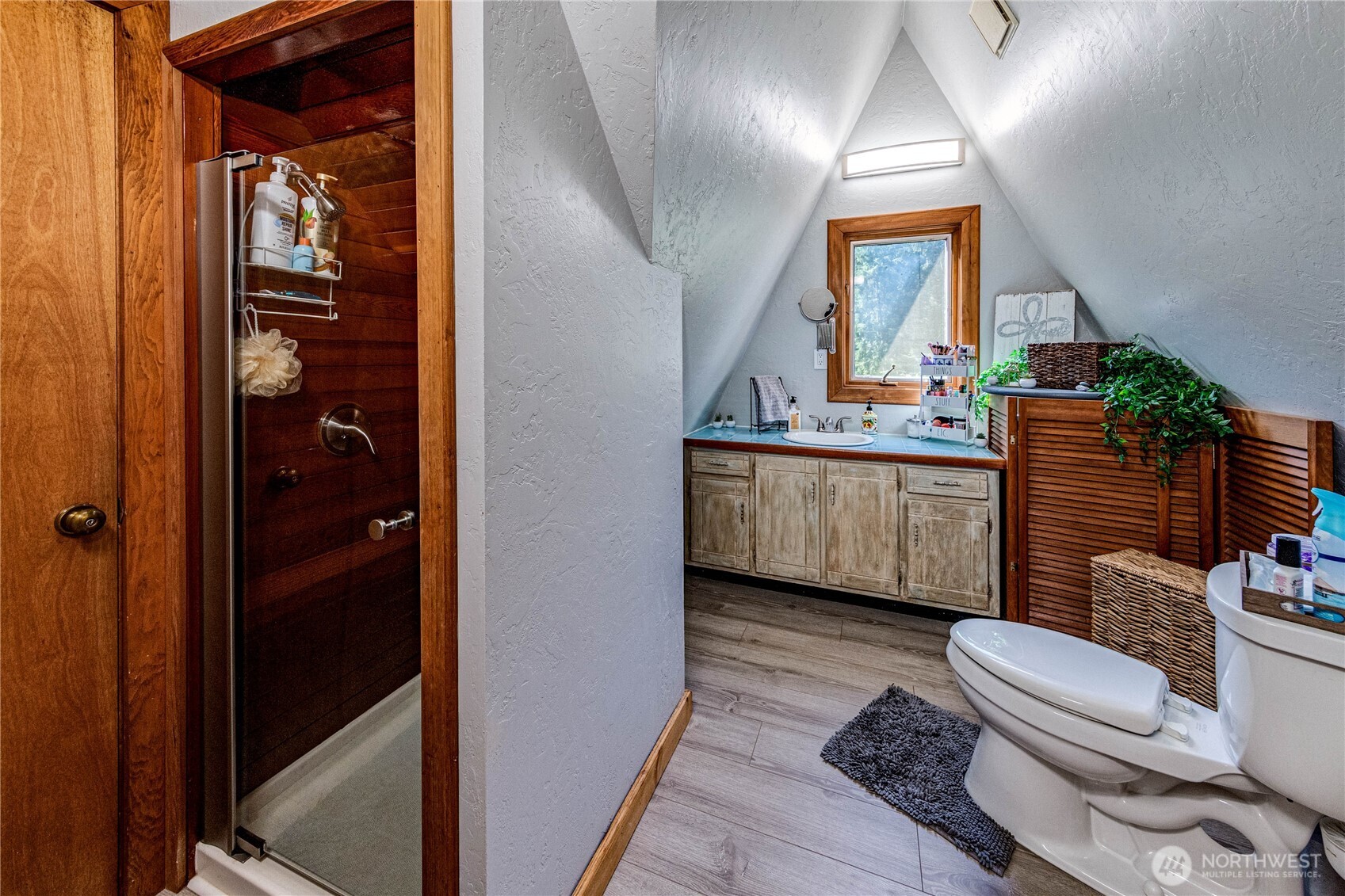 107 Dowan Creek Road Forks, WA 98331 - Photo 20 of 40 a living room with furniture and a window