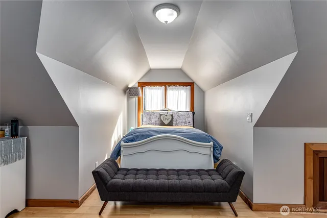 a living room with a couch and a window