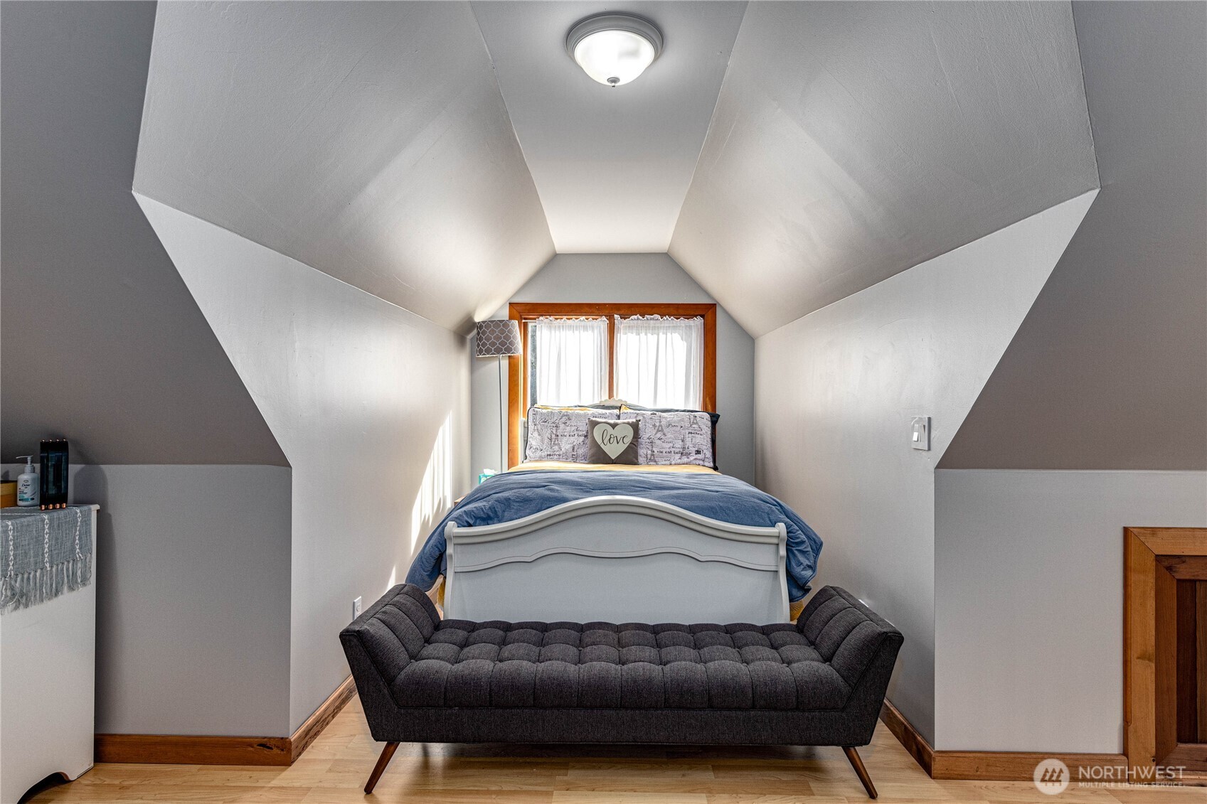 107 Dowan Creek Road Forks, WA 98331 - Photo 22 of 40 a living room with a couch and a window