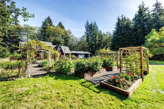 an aerial view of a house with a garden