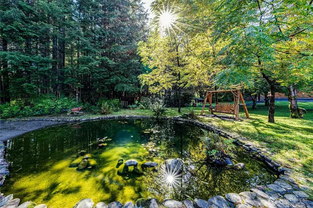 a view of a lake with a park