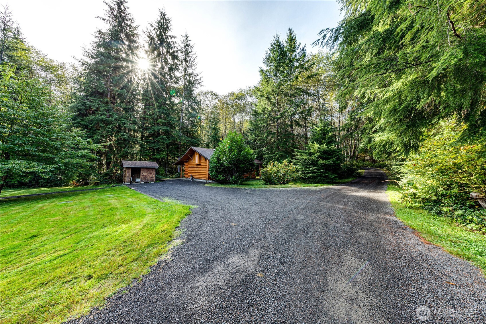 107 Dowan Creek Road Forks, WA 98331 - Photo 28 of 40 a view of a park with large trees