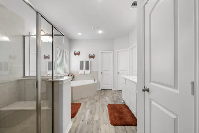 a bathroom with a sink and a shower