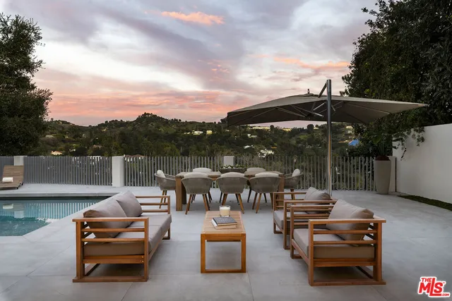 a view of a terrace with sitting area