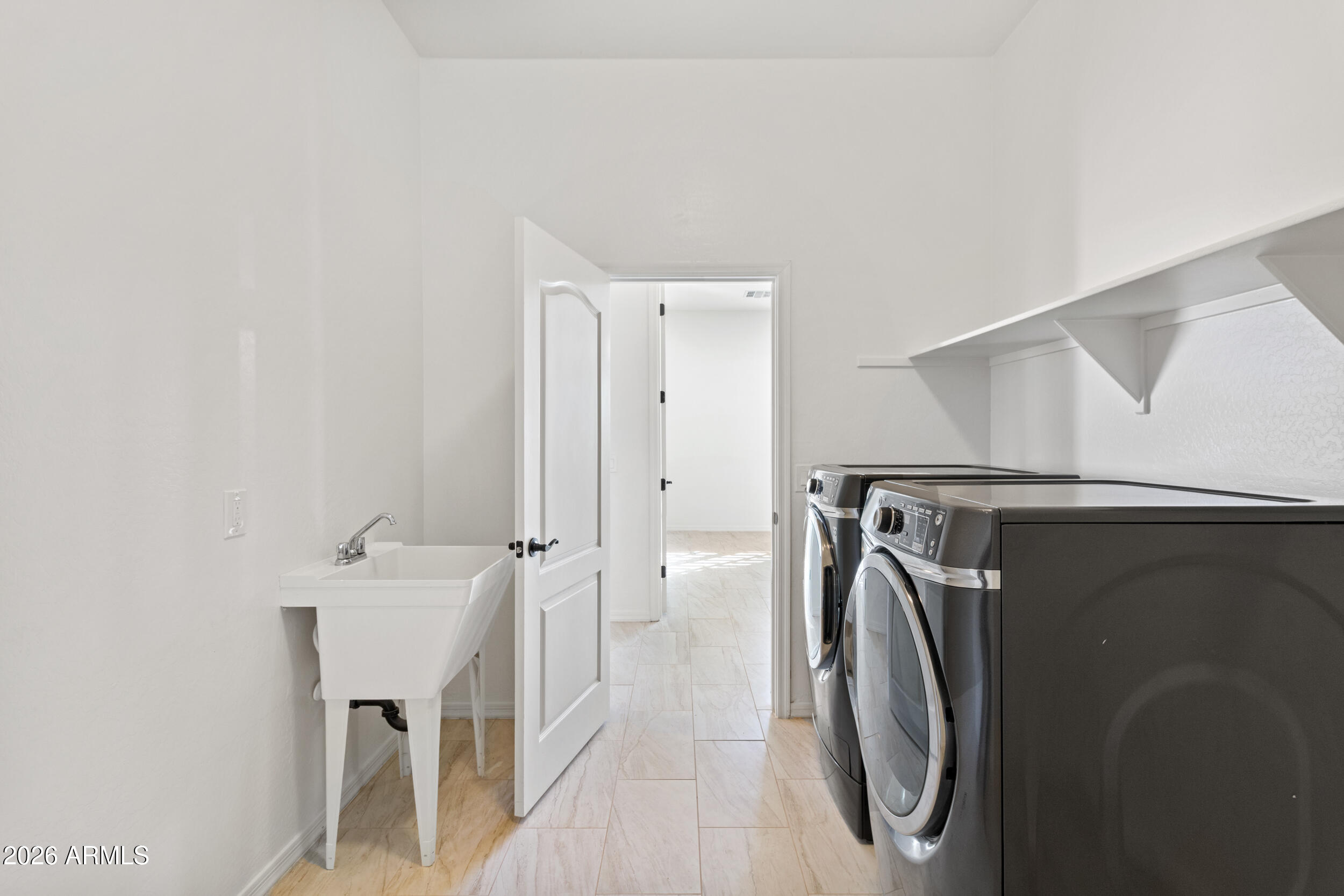 20537 West Valley View Drive Buckeye, AZ 85396 - Photo 16 of 32 a utility room with dryer and washer