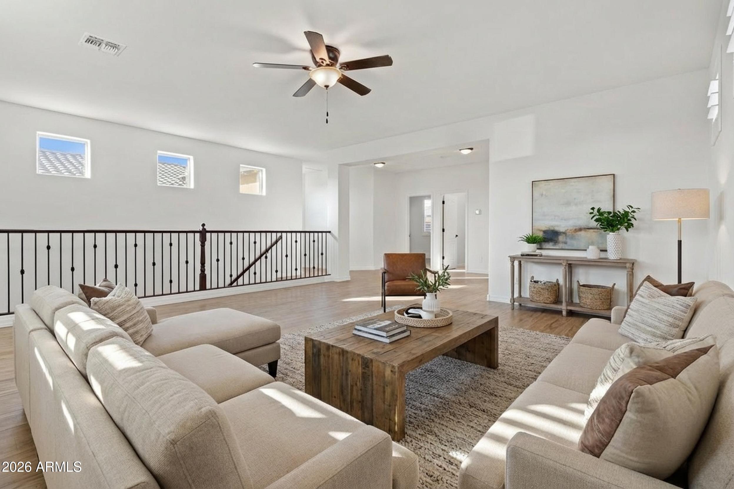 20537 West Valley View Drive Buckeye, AZ 85396 - Photo 17 of 32 a living room with furniture and a ceiling fan