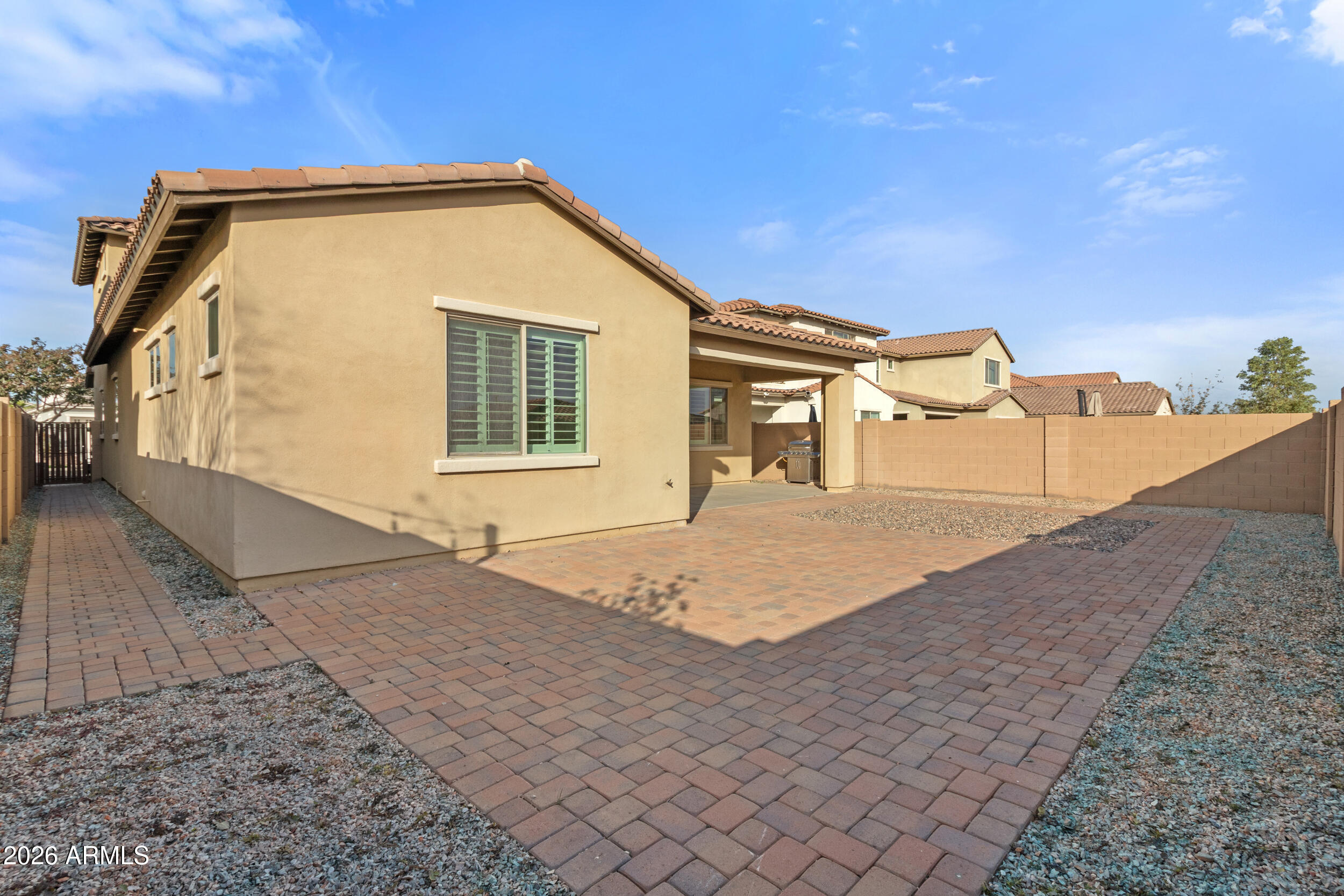 20537 West Valley View Drive Buckeye, AZ 85396 - Photo 29 of 32 a front view of a house with a yard
