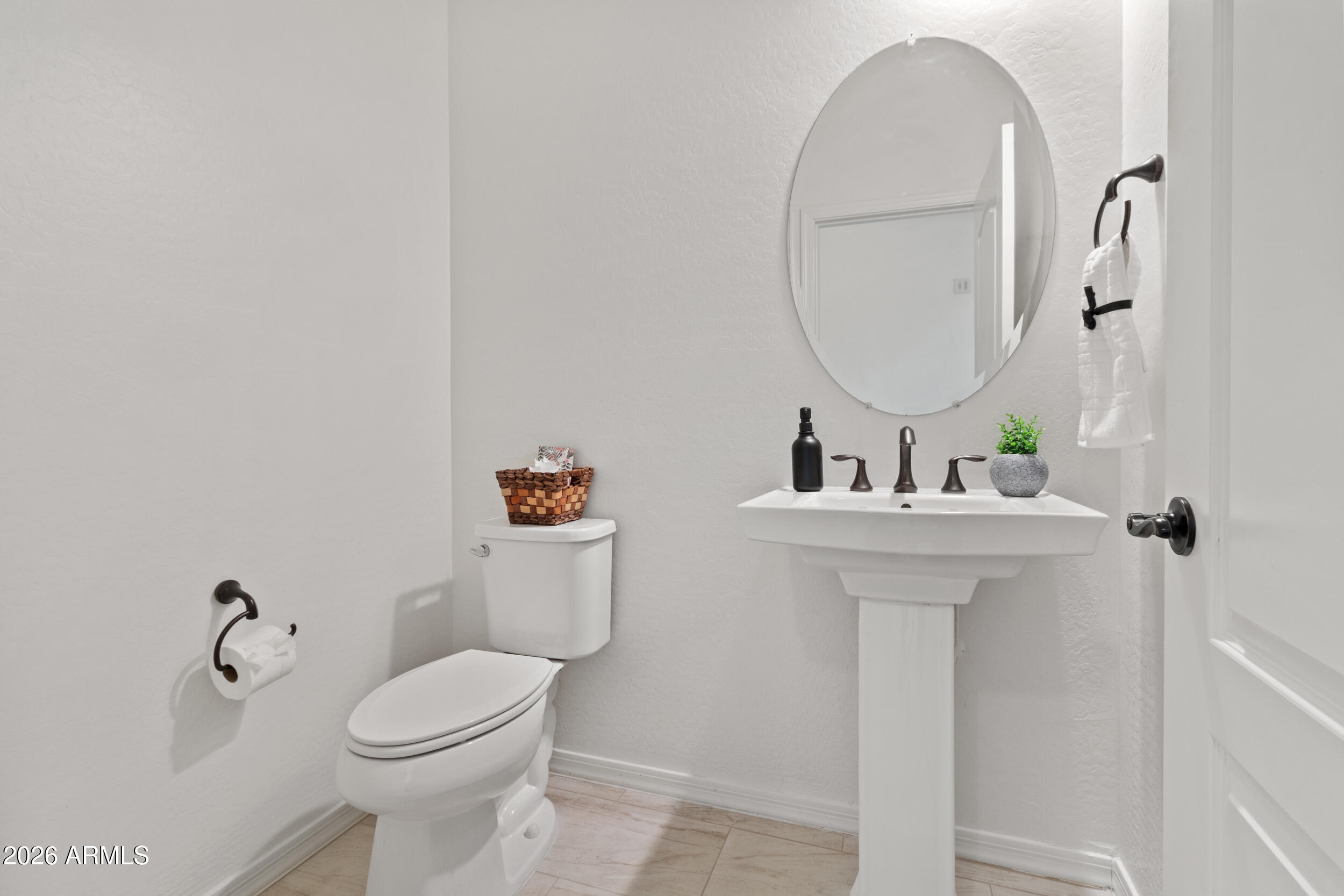 20537 West Valley View Drive Buckeye, AZ 85396 - Photo 4 of 32 a bathroom with a sink mirror and toilet
