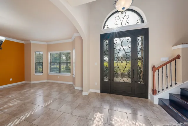 a view of an entryway with a door