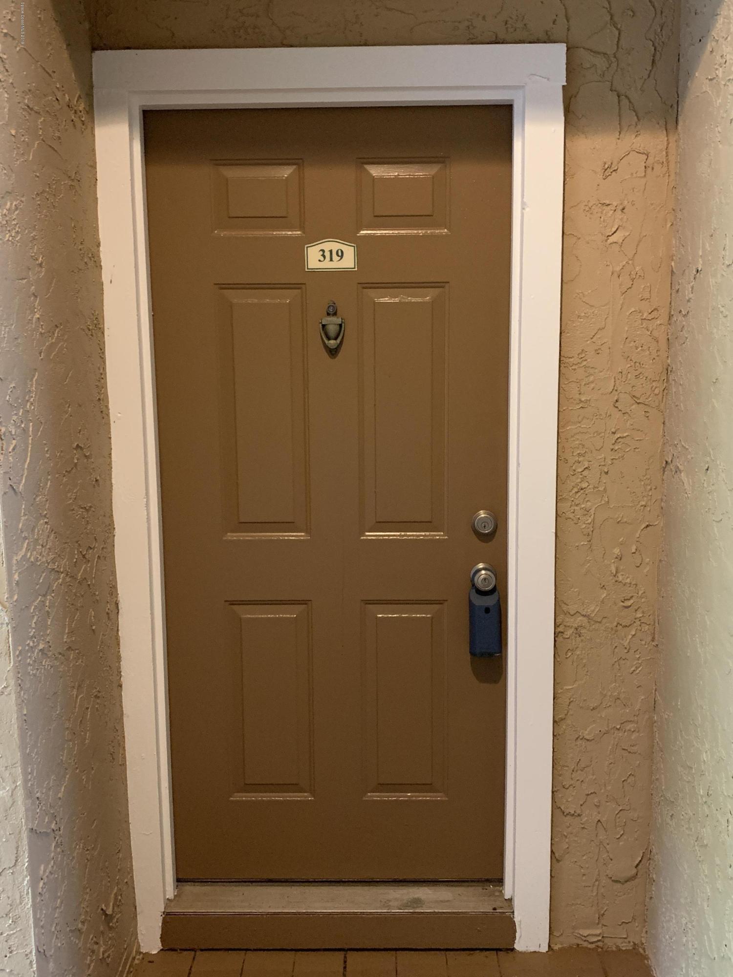 7667 North Wickham Road, Unit 319 Melbourne, FL 32940 - Photo 3 of 37 Front Door