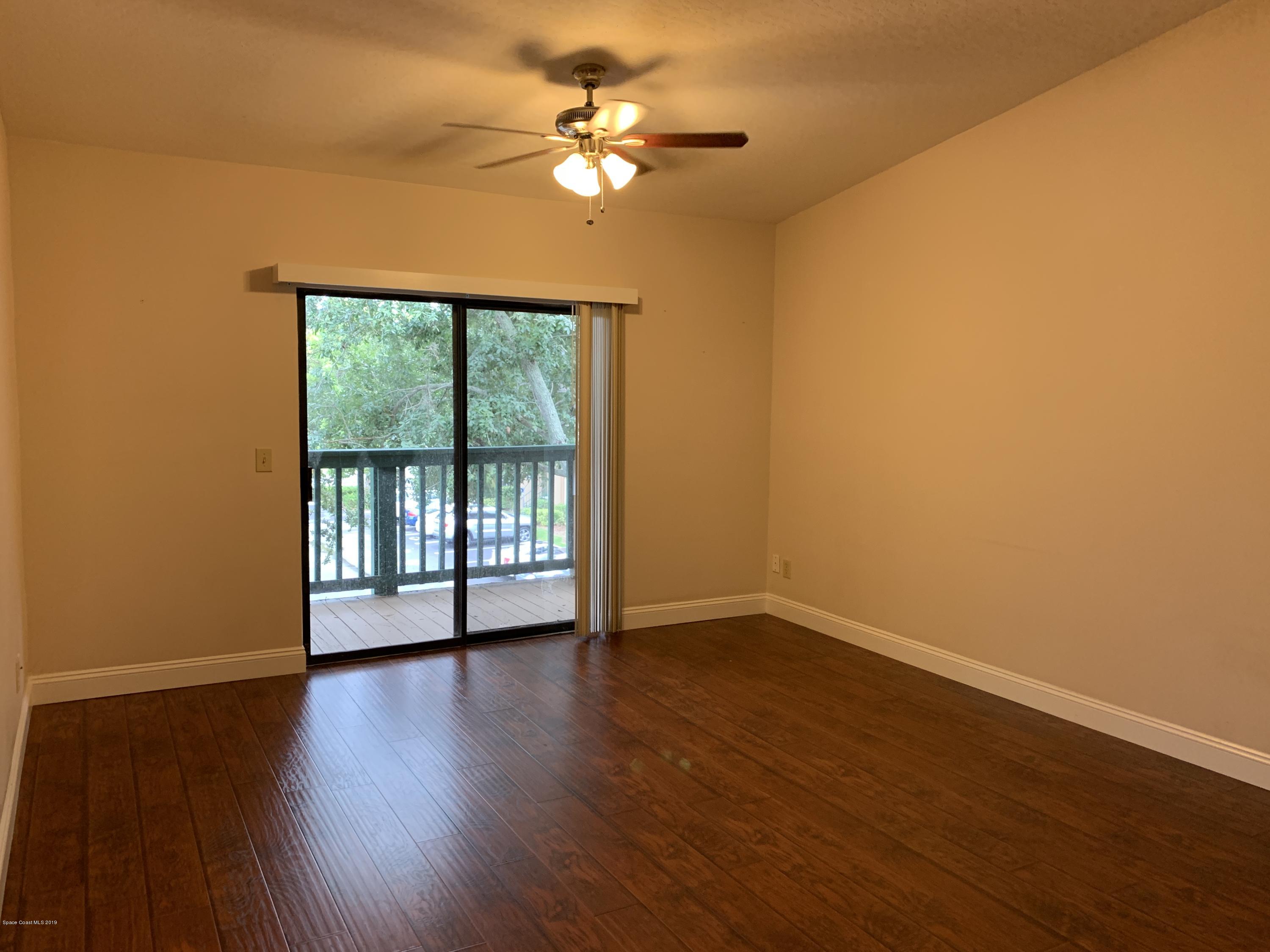 7667 North Wickham Road, Unit 319 Melbourne, FL 32940 - Photo 5 of 37 Living Room 2