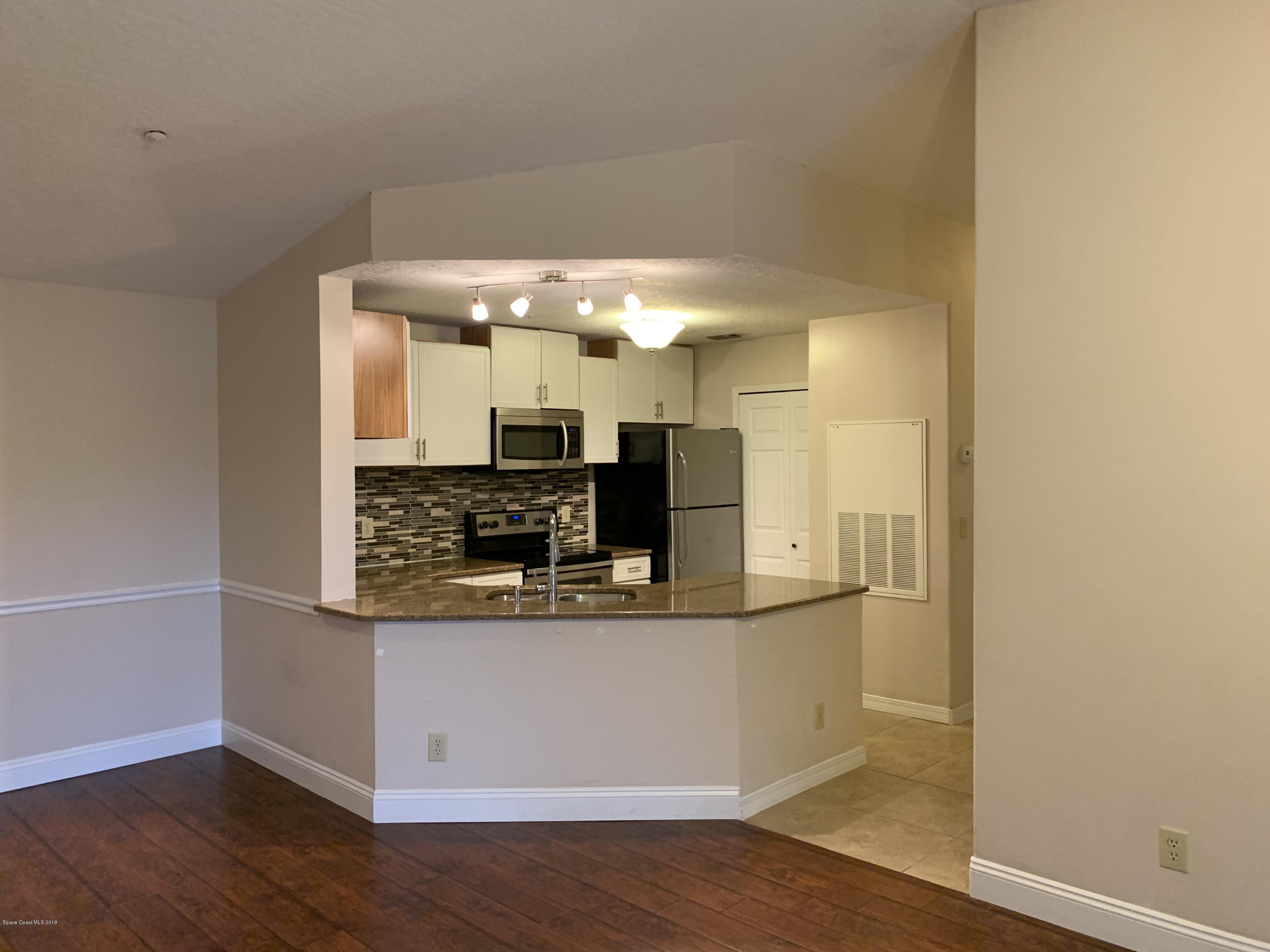 7667 North Wickham Road, Unit 319 Melbourne, FL 32940 - Photo 8 of 37 Kitchen 2