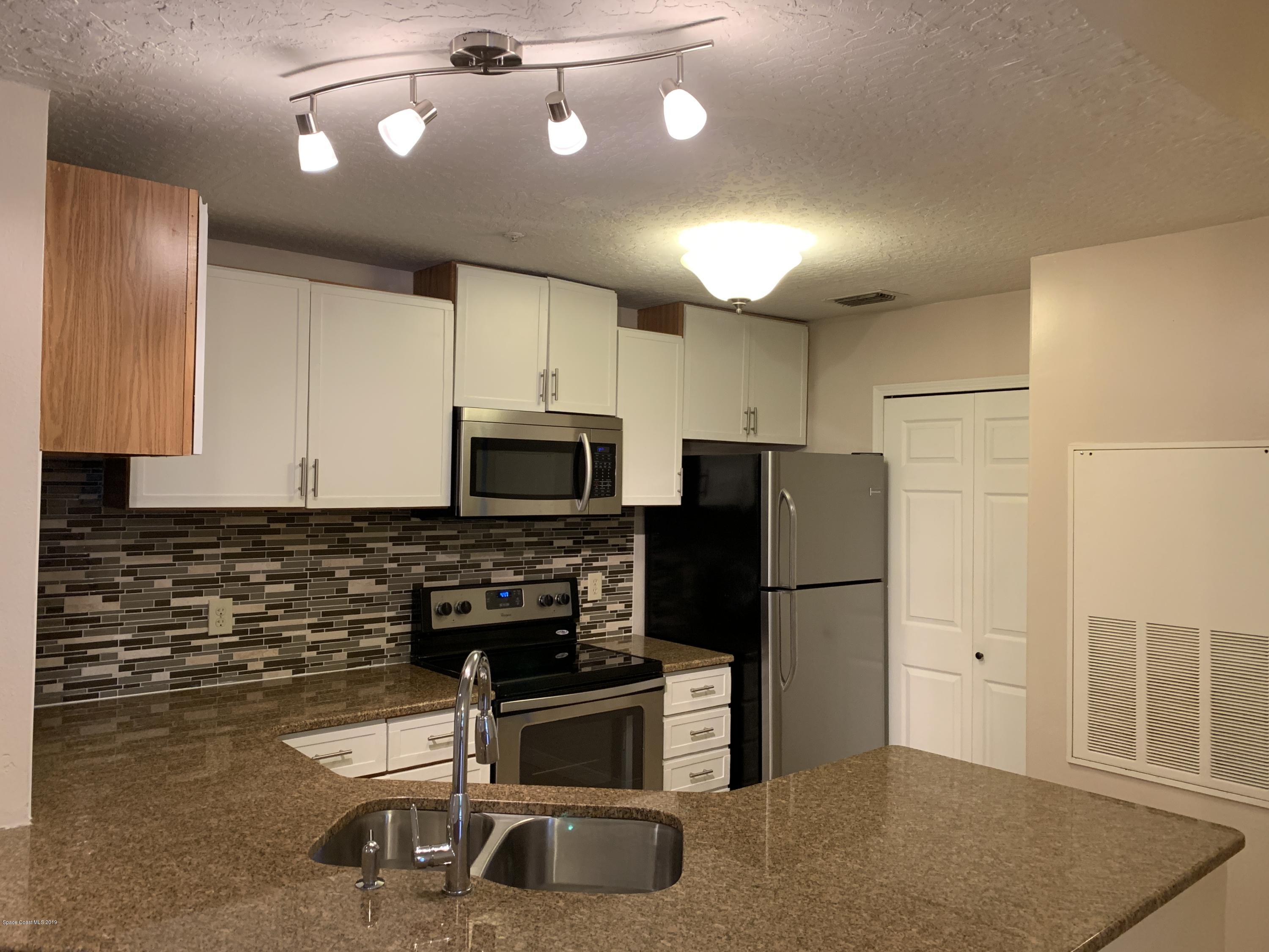 7667 North Wickham Road, Unit 319 Melbourne, FL 32940 - Photo 9 of 37 Kitchen 3