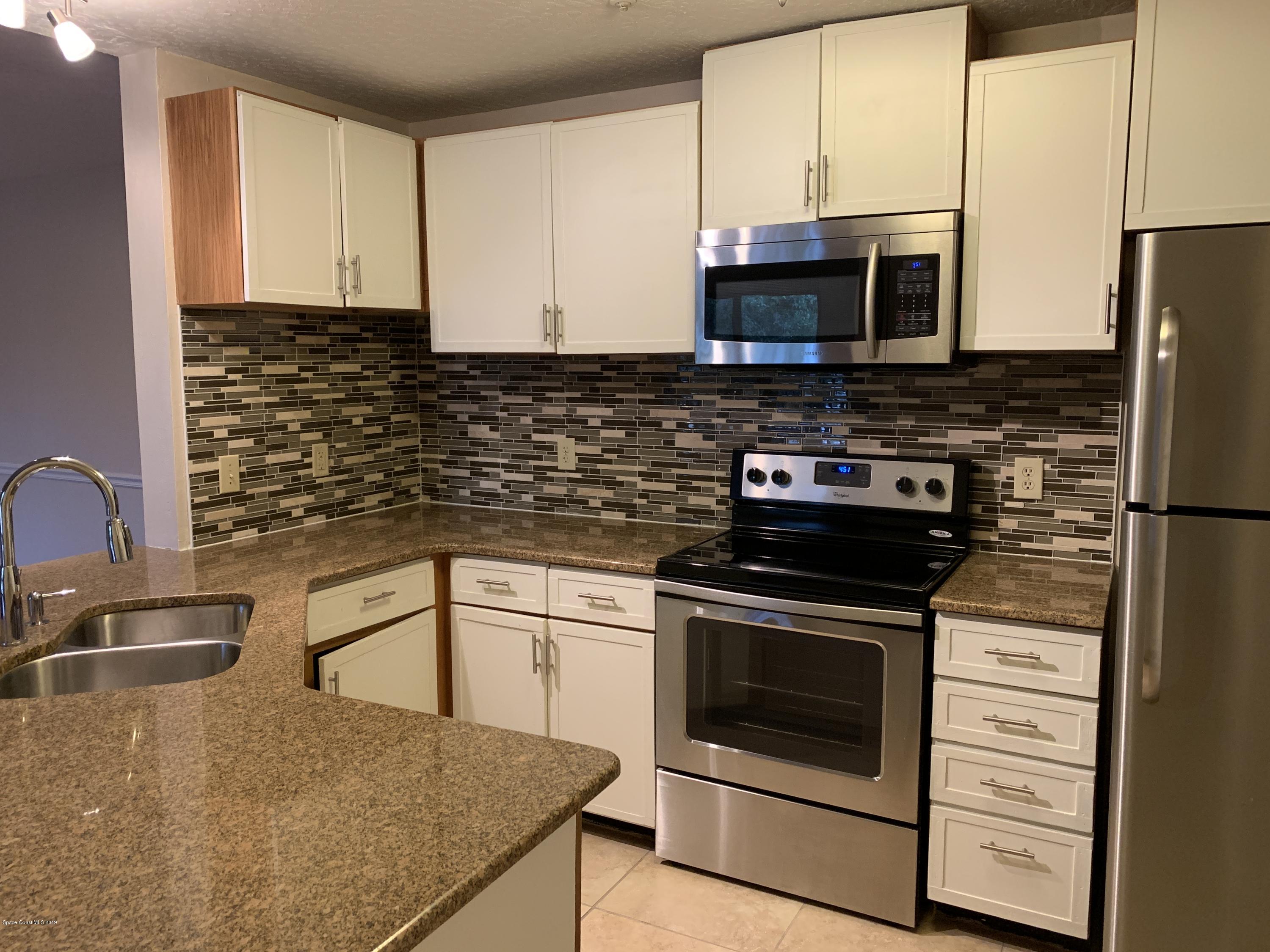 7667 North Wickham Road, Unit 319 Melbourne, FL 32940 - Photo 10 of 37 Kitchen 4