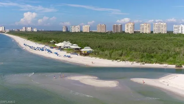 a view of a city street with a building in the background
