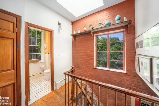 a view of a house with large windows