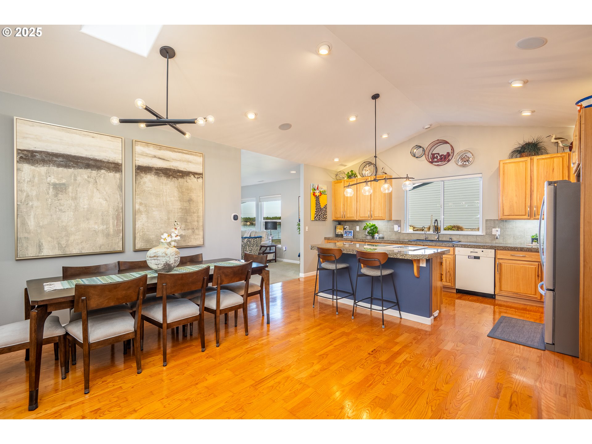 3315 Rhododendron Drive Florence, OR 97439 - Photo 17 of 48 a large kitchen with a table and chairs