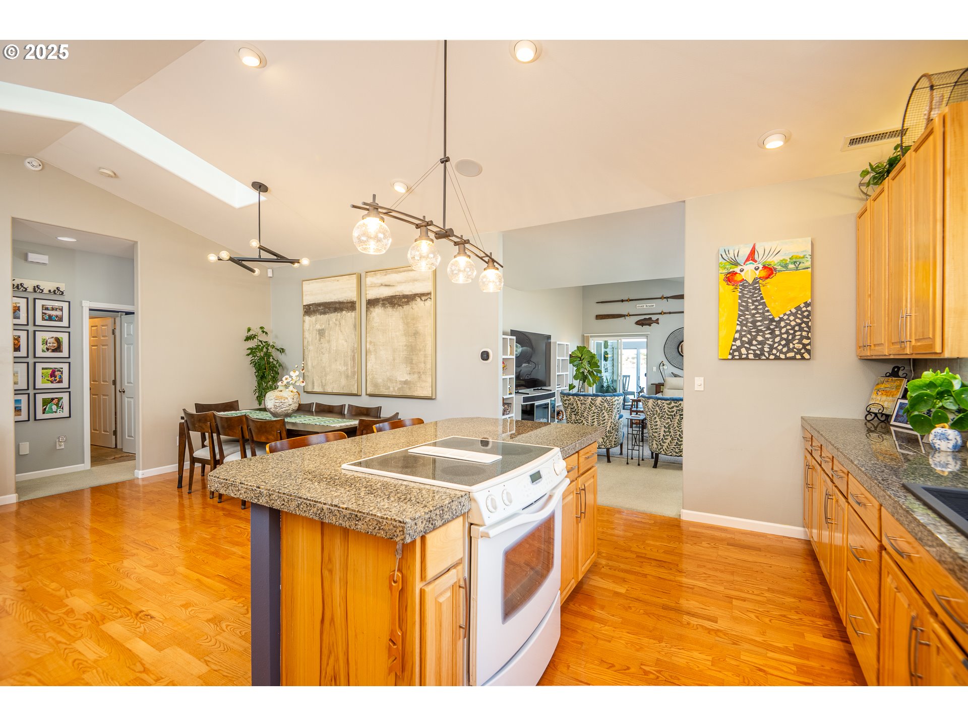 3315 Rhododendron Drive Florence, OR 97439 - Photo 18 of 48 a dining hall with stainless steel appliances granite countertop a sink and dining table