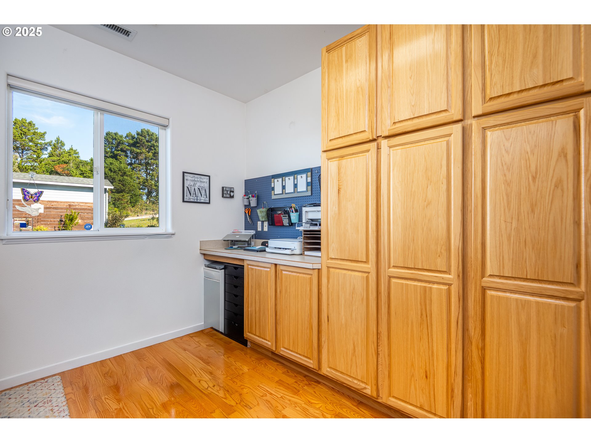 3315 Rhododendron Drive Florence, OR 97439 - Photo 23 of 48 a kitchen with stainless steel appliances granite countertop a refrigerator and a sink